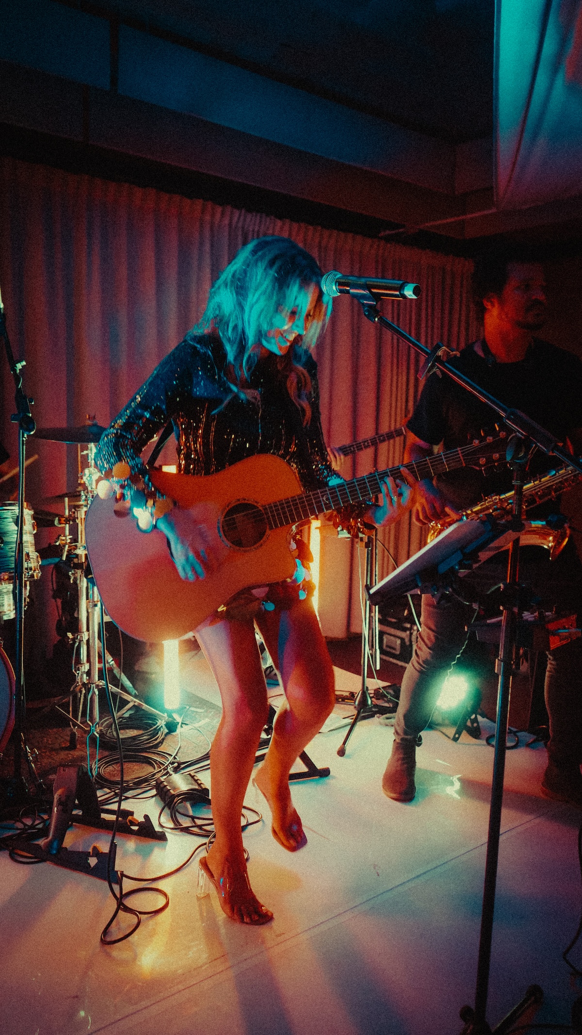 Miss Day guitarist performing